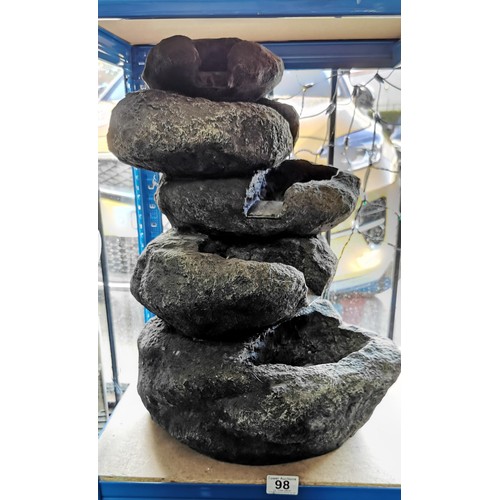 98 - Natural look stacked rocks garden water feature. Measures 53cm height.