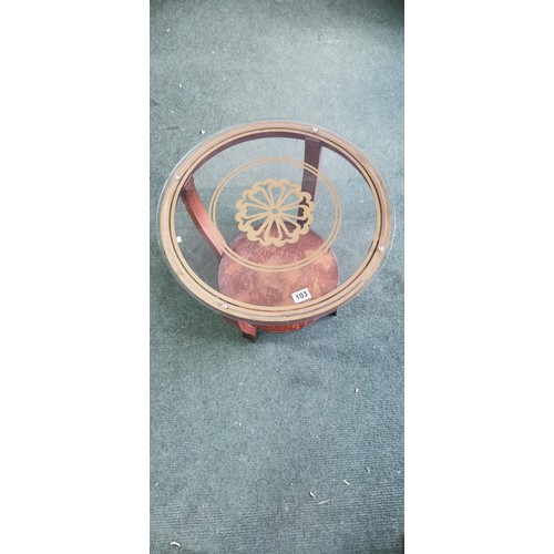 103 - Vintage art deco glass topped circular coffee table with an attractive gold design painted on the gl... 