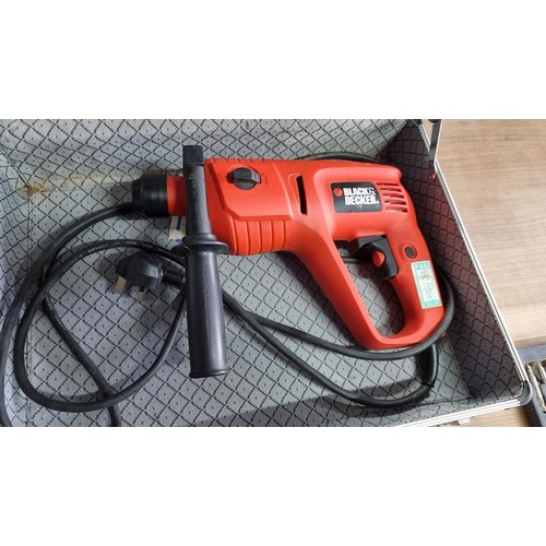 56 - Cased Black and Decker 550w hammer drill in a good heavy duty lockable case