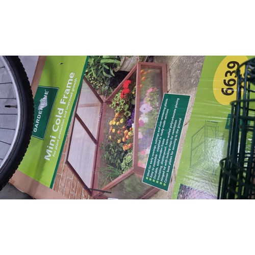 68 - Boxed as new mini cold frame for plant protection and growth by Garden line along with 3x garden squ... 