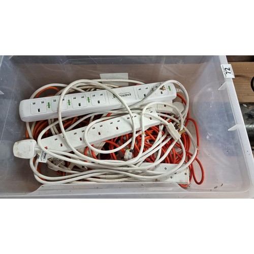 72 - Box of extension cables and multi plugs along with an electric motor in working condition