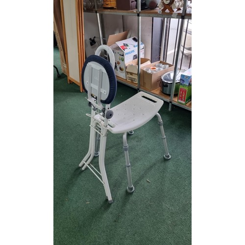 77 - Adjustable folding seat along with a shower chair