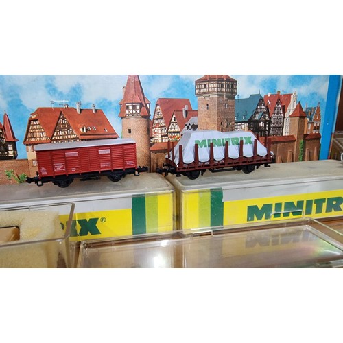 268 - Quantity of N gauge rolling stock and carriages inc 2x by Minitrix a Hornby carriage etc