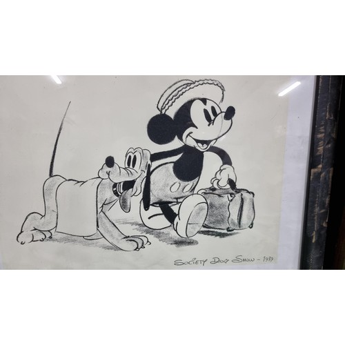 293 - Framed and glazed picture of Mikey Mouse and Pluto Titled society dog show 1939 height of 49cm width... 