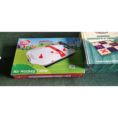 129 - 2x boxed games inc Chad Valley Air Hockey table and garden Noughts & Crosses