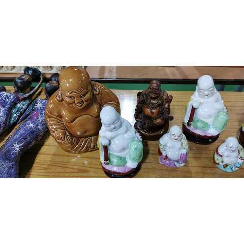 189 - Quantity of 7x laughing Buddha (6x ceramic and 1x resin) highly detailed, largest measures 18cm heig... 