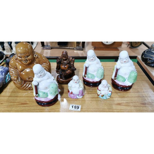 189 - Quantity of 7x laughing Buddha (6x ceramic and 1x resin) highly detailed, largest measures 18cm heig... 