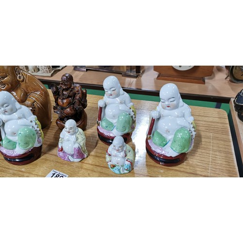 189 - Quantity of 7x laughing Buddha (6x ceramic and 1x resin) highly detailed, largest measures 18cm heig... 