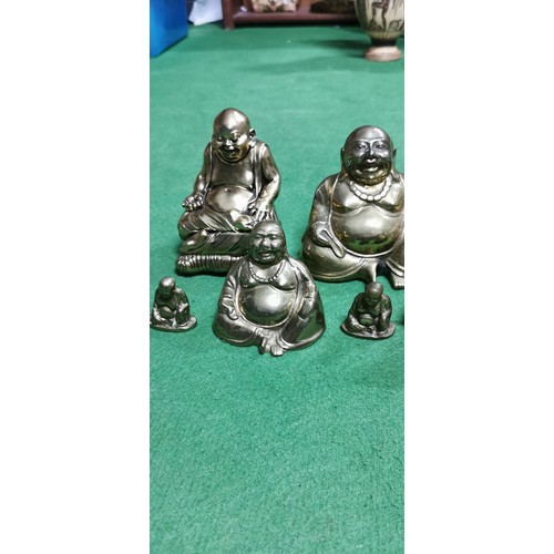 190 - Quantity of 9x laughing buddha figures (8x are brass and 1x is resin) showing good details. Measures... 