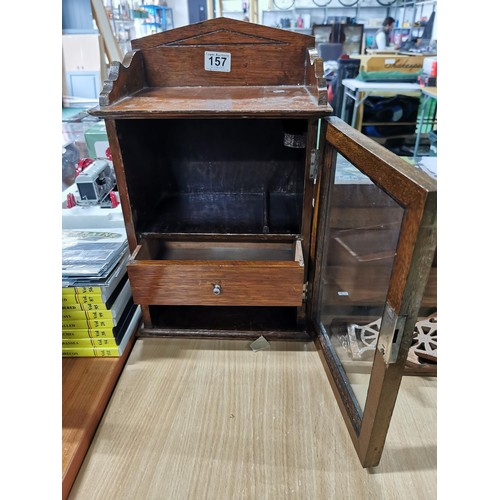 157 - Antique smokers cabinet with drawer to the centre and pipe rack to the side height of 45cm width of ... 