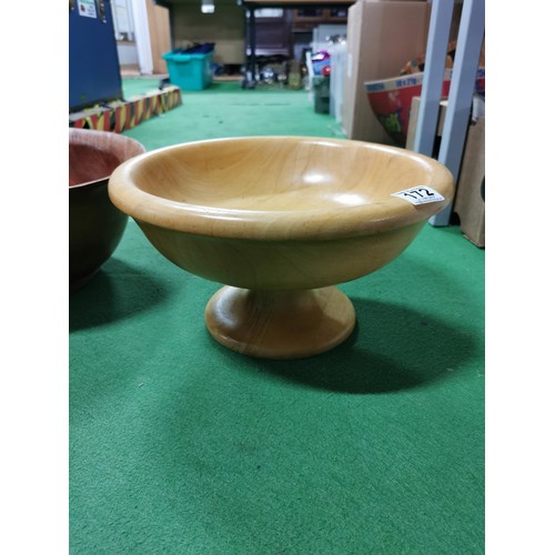 172 - 3x well carved solid wood fruit bowls, 1x in a pedestal design all in very good order. Largest measu... 