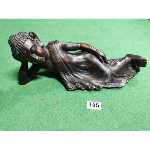 185 - Bronze effect resin buddha in a laying down position showing good fine details. Measures 16cm height... 