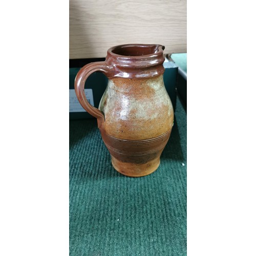 221 - Treakle salt glazed Armogres Belgium Pottery jug. Measures 25cm height x 15cm diameter not including... 