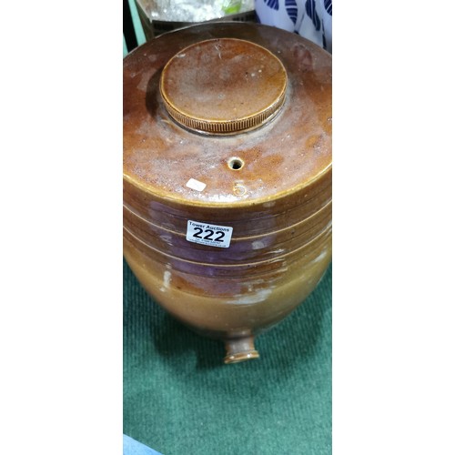 222 - Large treacle glazed stoneware cast barrel complete with lid. Measures 44cm height x 30cm diameter