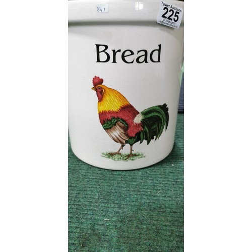 225 - Large ceramic bread bin with cockerel print on the front and complete with wooden top. Measures 27cm... 