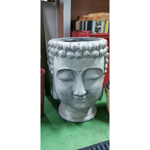 226 - Quantity of ceramic plant pots and large Buddha head plant pot all various colours and in very good ... 