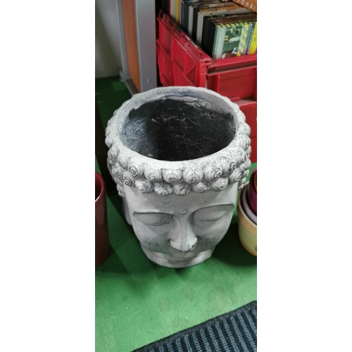 226 - Quantity of ceramic plant pots and large Buddha head plant pot all various colours and in very good ... 