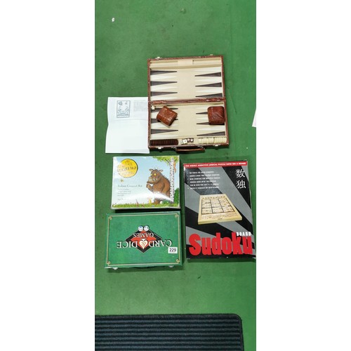 229 - Quantity of various games inc Backgammon set in leather case, indoor croquet set, Card and Dice Game... 