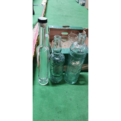 239 - Quantity of decorative glass vintage 3D textured bottles, Drystone English Cider glasses and Stella ... 