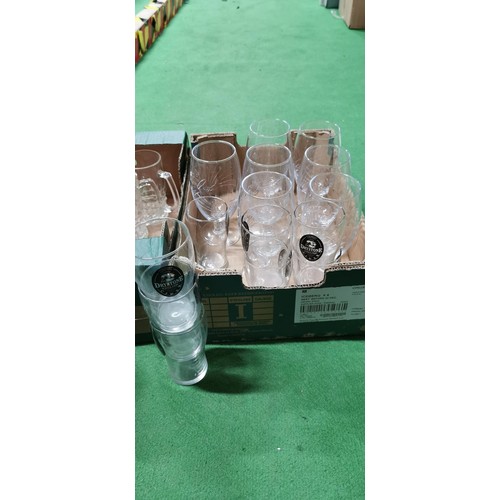 239 - Quantity of decorative glass vintage 3D textured bottles, Drystone English Cider glasses and Stella ... 