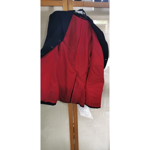 78 - Medium size riding / hunting jacket in good overall condition with red lining inside which is in goo... 