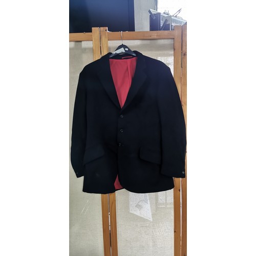 78 - Medium size riding / hunting jacket in good overall condition with red lining inside which is in goo... 