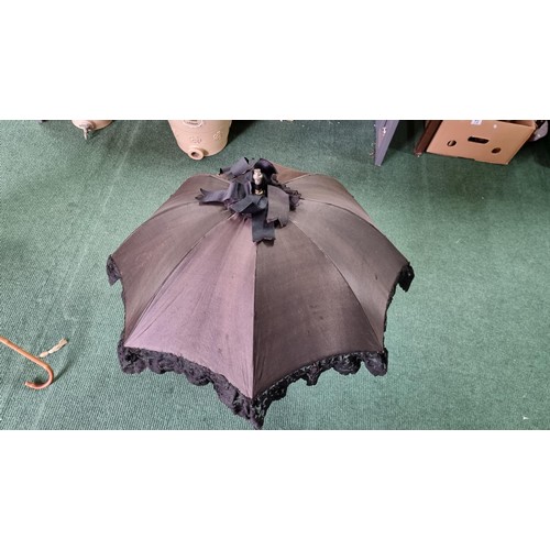 487 - 2x victorian parasols inc a black silk and lace parasol. The black parasol has a briar wood handle, ... 