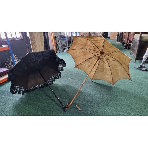 487 - 2x victorian parasols inc a black silk and lace parasol. The black parasol has a briar wood handle, ... 