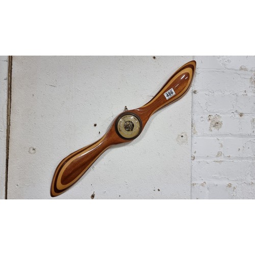 486 - Vintage solid wood propellor formed barometer with good choice cuts of wood post set hand for pressu... 