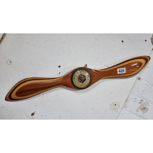 486 - Vintage solid wood propellor formed barometer with good choice cuts of wood post set hand for pressu... 