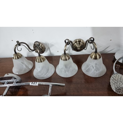 531 - Collection of 2 pairs of modern wall light fittings along with a three spot light ceiling fitting