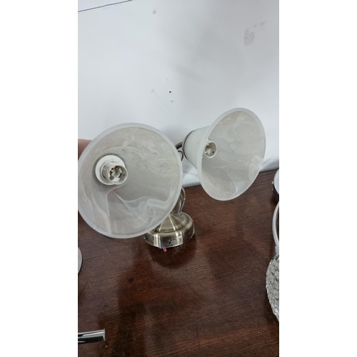 531 - Collection of 2 pairs of modern wall light fittings along with a three spot light ceiling fitting