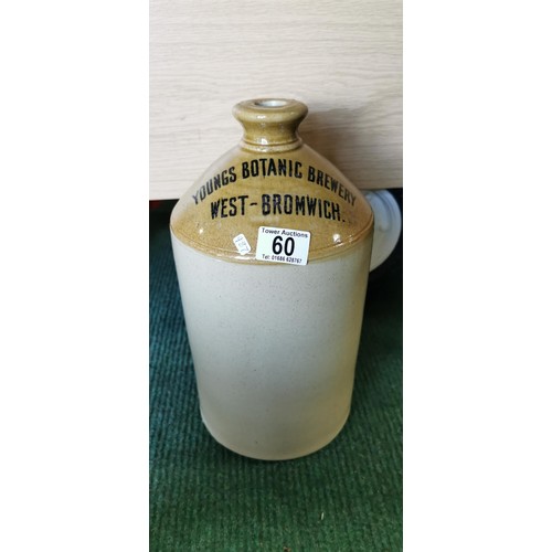 60 - Glazed stoneware flagon stamped Youngs Botanic Brewery West Bromwich. Measures 32cm height x 17.5cm ... 