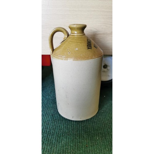 60 - Glazed stoneware flagon stamped Youngs Botanic Brewery West Bromwich. Measures 32cm height x 17.5cm ... 