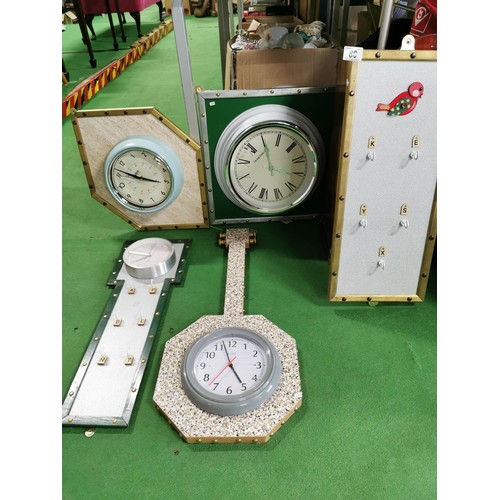 80 - Quantity of retro handmade wall clocks on various wooden backing, one in the shape of a banjo, one h... 