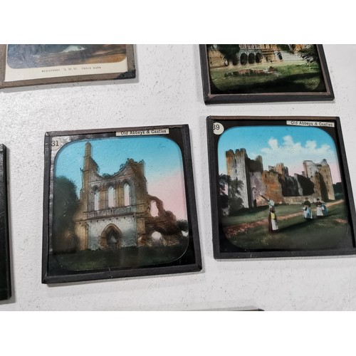 39 - Quantity of 13x antique magic lantern glass slides mostly of old abbeys and castles inc an interesti... 