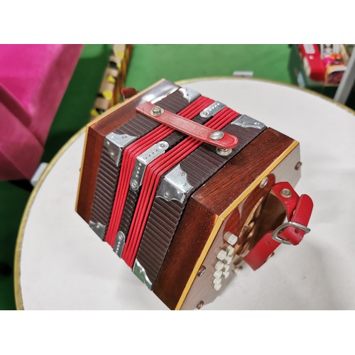 42 - Vintage good quality 20 plus 1 button concertina in mahogany in excellent clean condition throughout... 