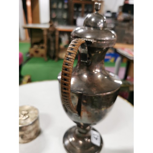 43 - Vintage navy white metal lidded pot along with a silver-plated wicker handled coffee pot height of b... 