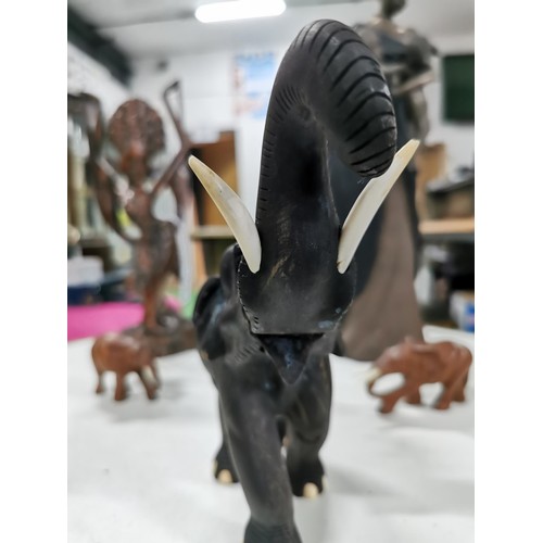 46 - Quantity of ethnic items inc a good solid ebony wood elephant a well carved ethnic dancing lady with... 