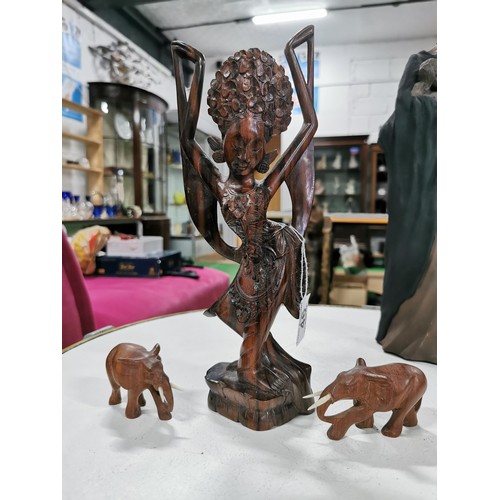 46 - Quantity of ethnic items inc a good solid ebony wood elephant a well carved ethnic dancing lady with... 