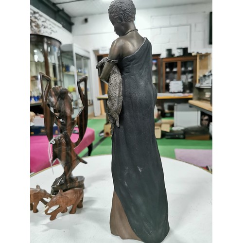 46 - Quantity of ethnic items inc a good solid ebony wood elephant a well carved ethnic dancing lady with... 