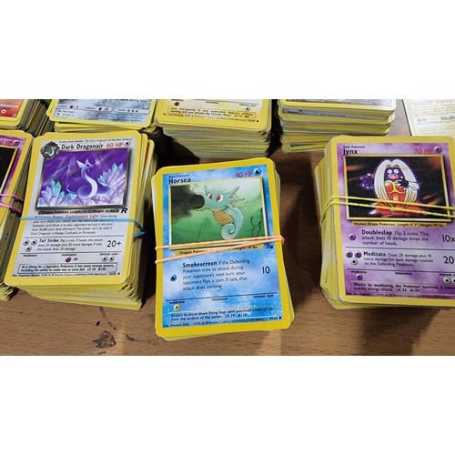 34 - A large comprehensive collection of Pokemon items inc a very large collection of Pokemon cards of va... 