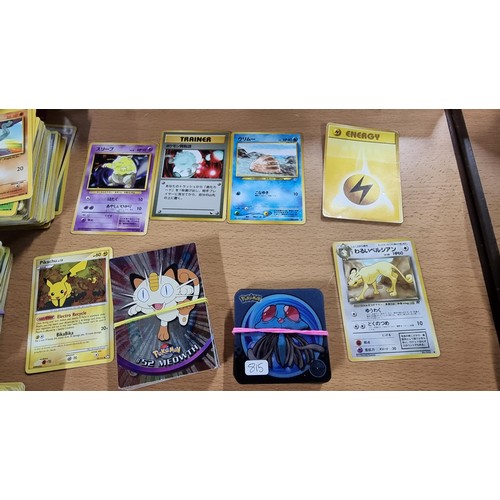 34 - A large comprehensive collection of Pokemon items inc a very large collection of Pokemon cards of va... 