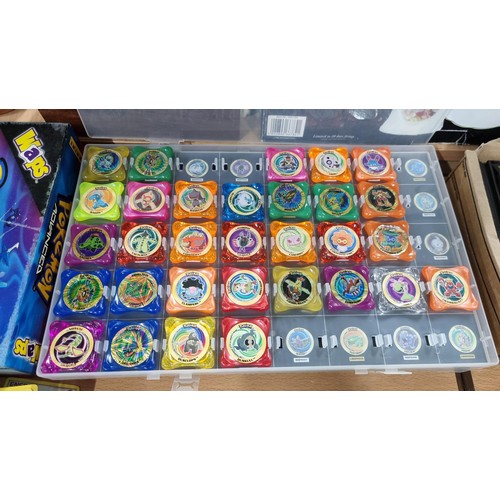 34 - A large comprehensive collection of Pokemon items inc a very large collection of Pokemon cards of va... 