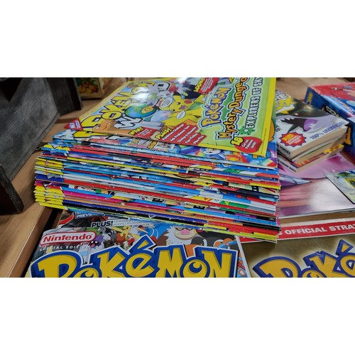 34 - A large comprehensive collection of Pokemon items inc a very large collection of Pokemon cards of va... 