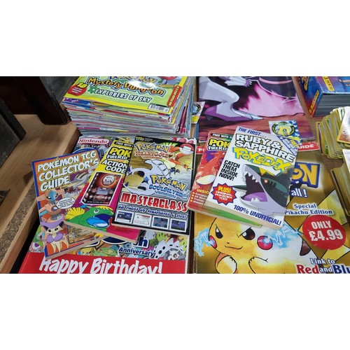 34 - A large comprehensive collection of Pokemon items inc a very large collection of Pokemon cards of va... 