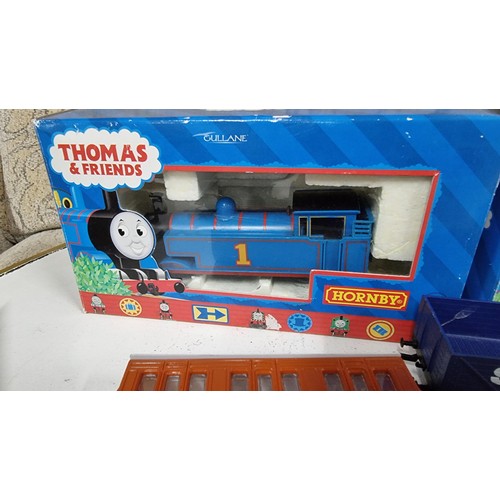 7 - Quantity of Hornby Thomas the tank locomotive items inc a boxed Thomas the tank locomotive body roll... 