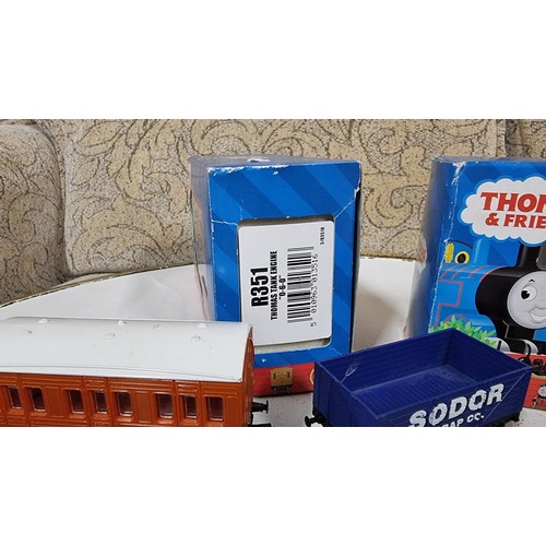 7 - Quantity of Hornby Thomas the tank locomotive items inc a boxed Thomas the tank locomotive body roll... 