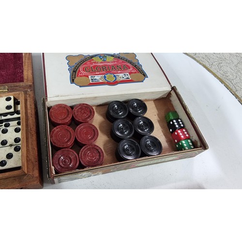 8 - A quantity of of various games inc well carved wooden box containing a set of antique bone dominoes ... 