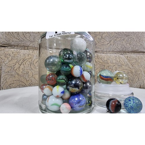 10 - Jar full of various vintage collectable marbles inc large marbles